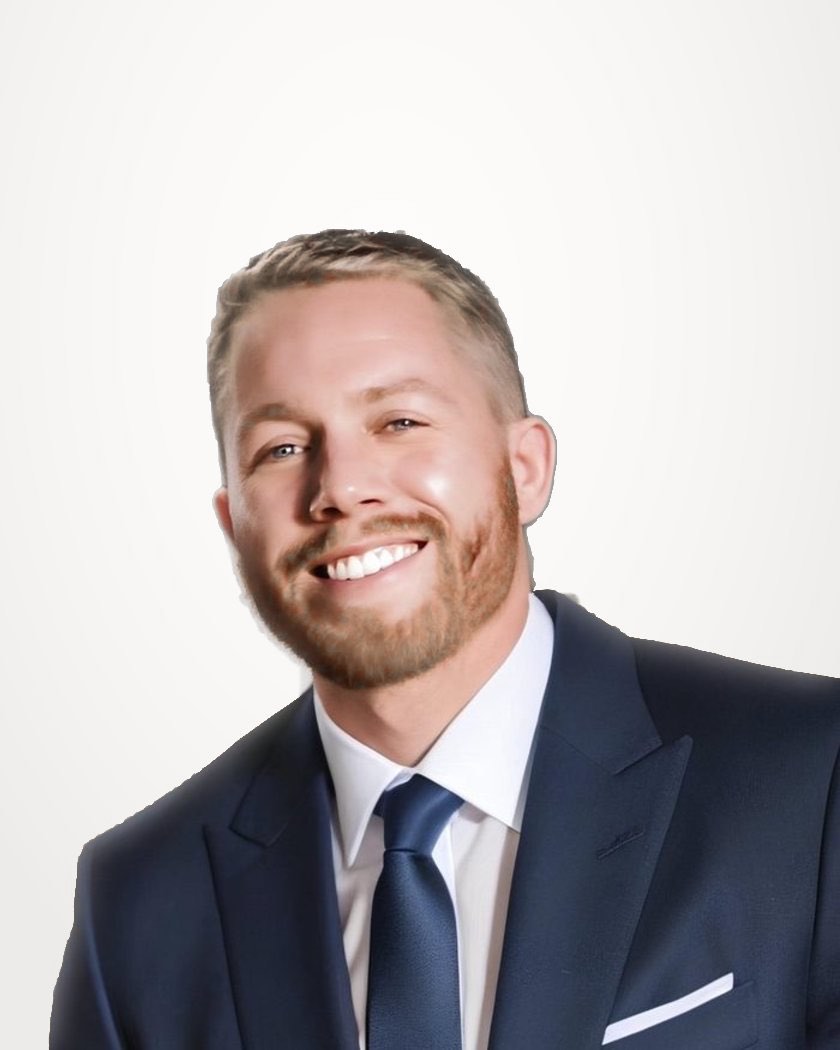 Me, smiling, in a navy suit